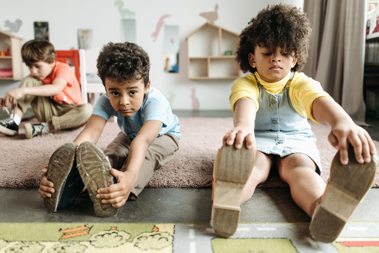 Children practising stretching and movement — illustrative stock photograph